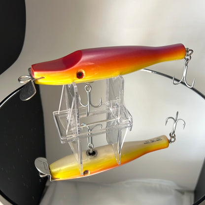 wood lure with metal lip painted Orange, Purple, and Yellow 5.25" long